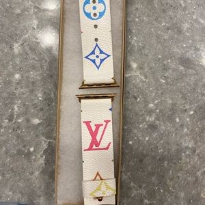 LV iPhone watch bracket. New condition. Fits iWatch that is 44m.